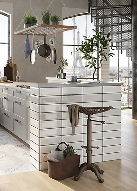 Aranżacja kuchni z białą cegłą na ścianie