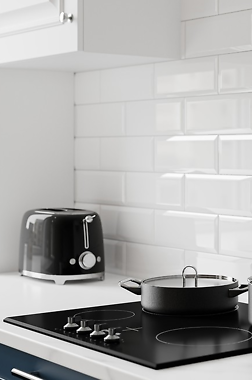 Aranżacja kuchni z białą cegłą na ścianie