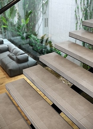 Aranżacja salonu z betonem na ścianie